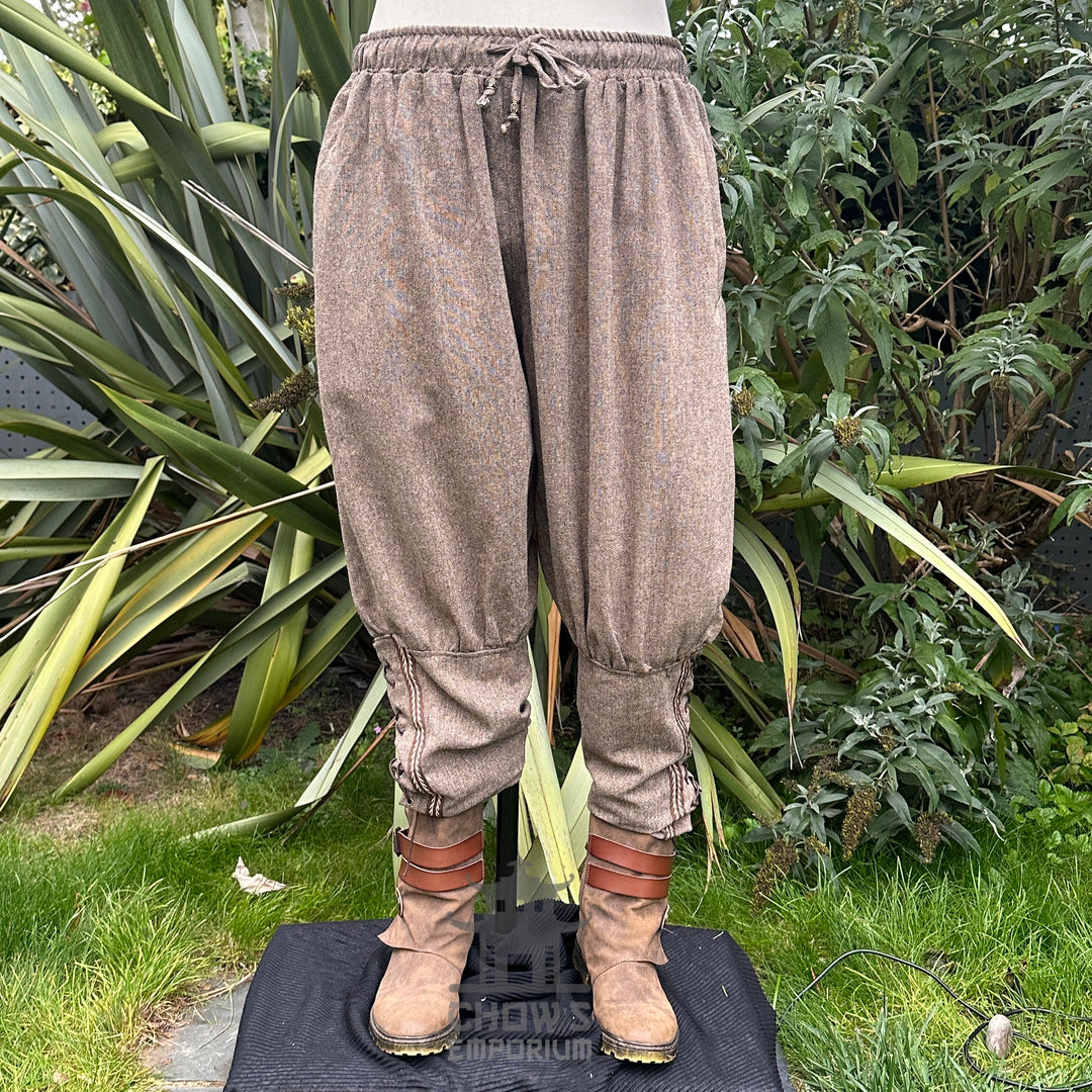 brown wool Viking pants with braided trim