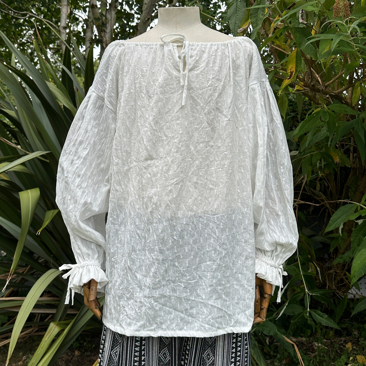unisex white medieval shirt with round neck.