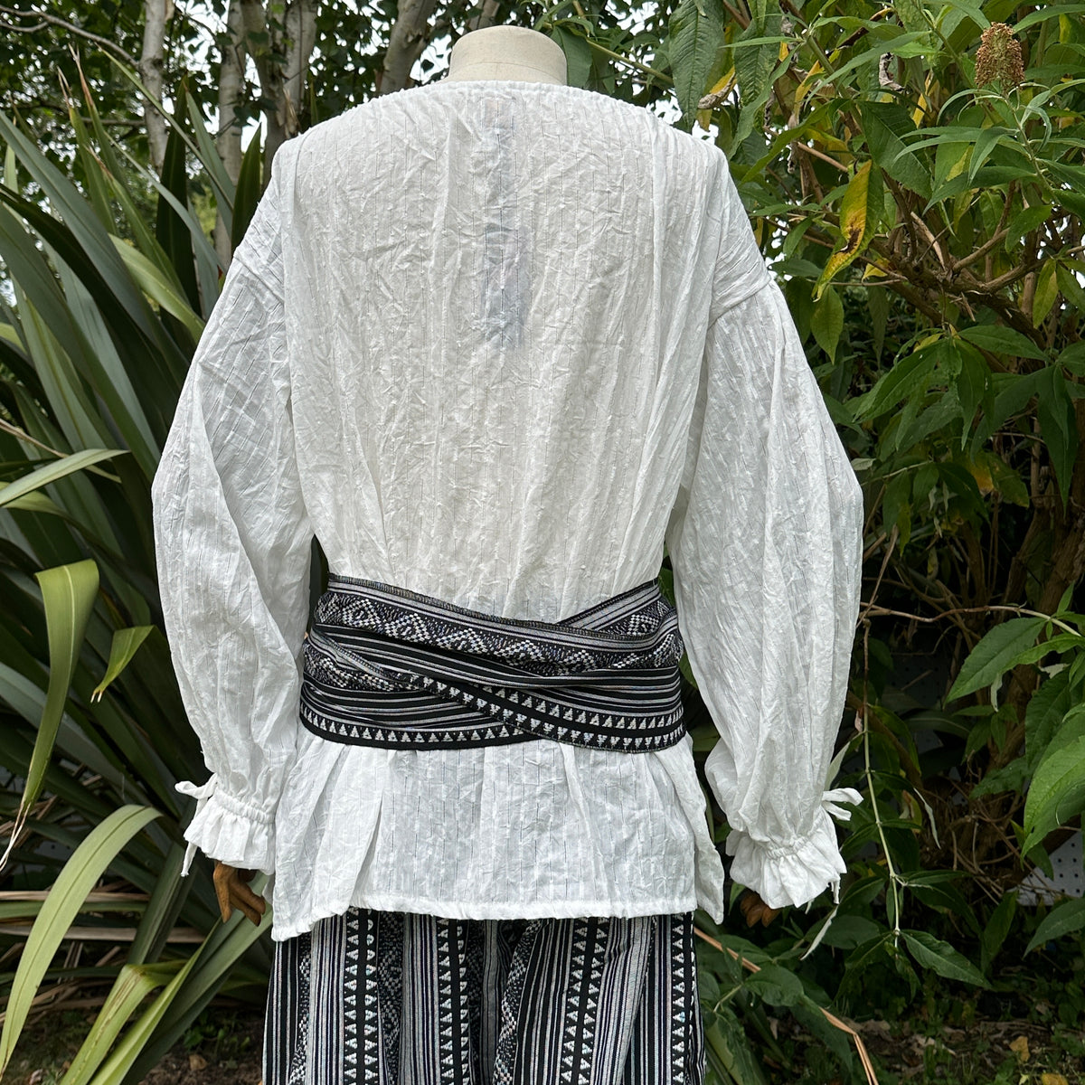 white round-neck medieval shirt.
