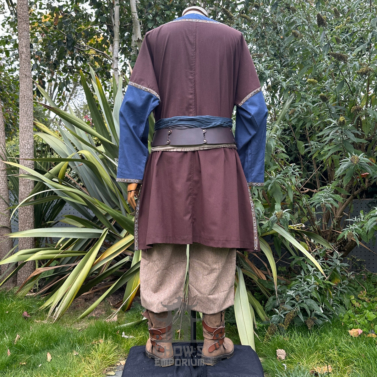 Back view Sand Mage LARP set: brown and blue robe, tan pants, belt.