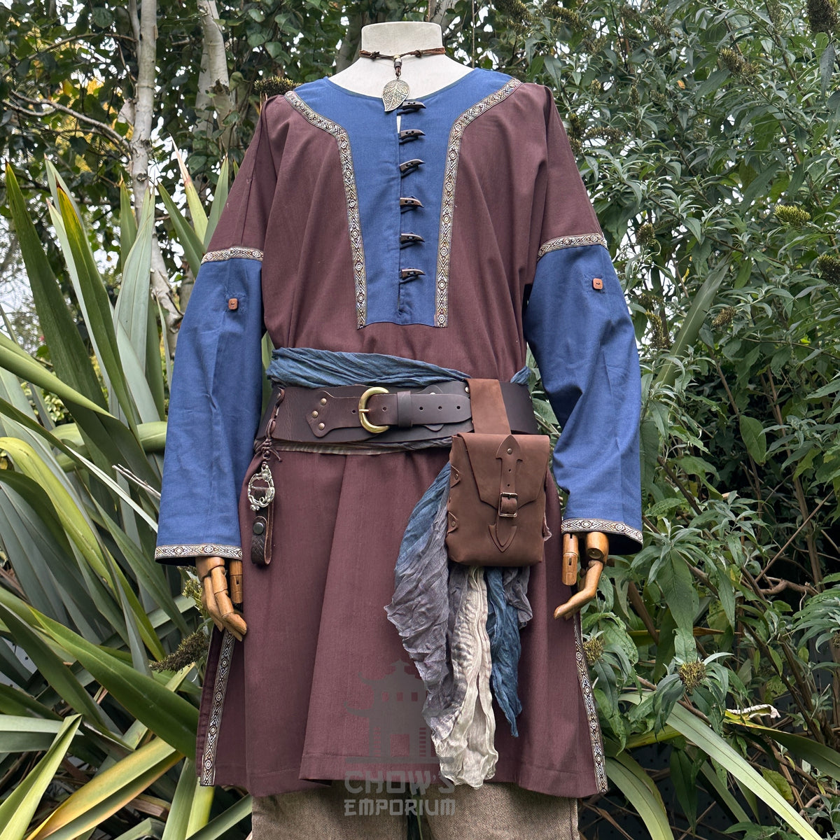 Medieval LARP ranger outfit with brown tunic, blue accents, leather belt.
