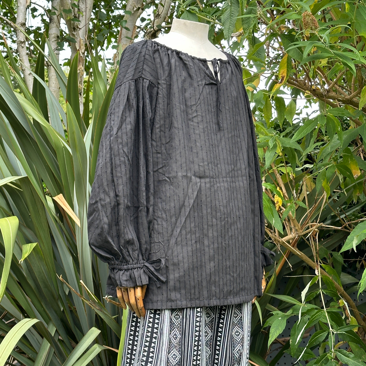 Black round neck medieval LARP shirt in cotton, front angle.