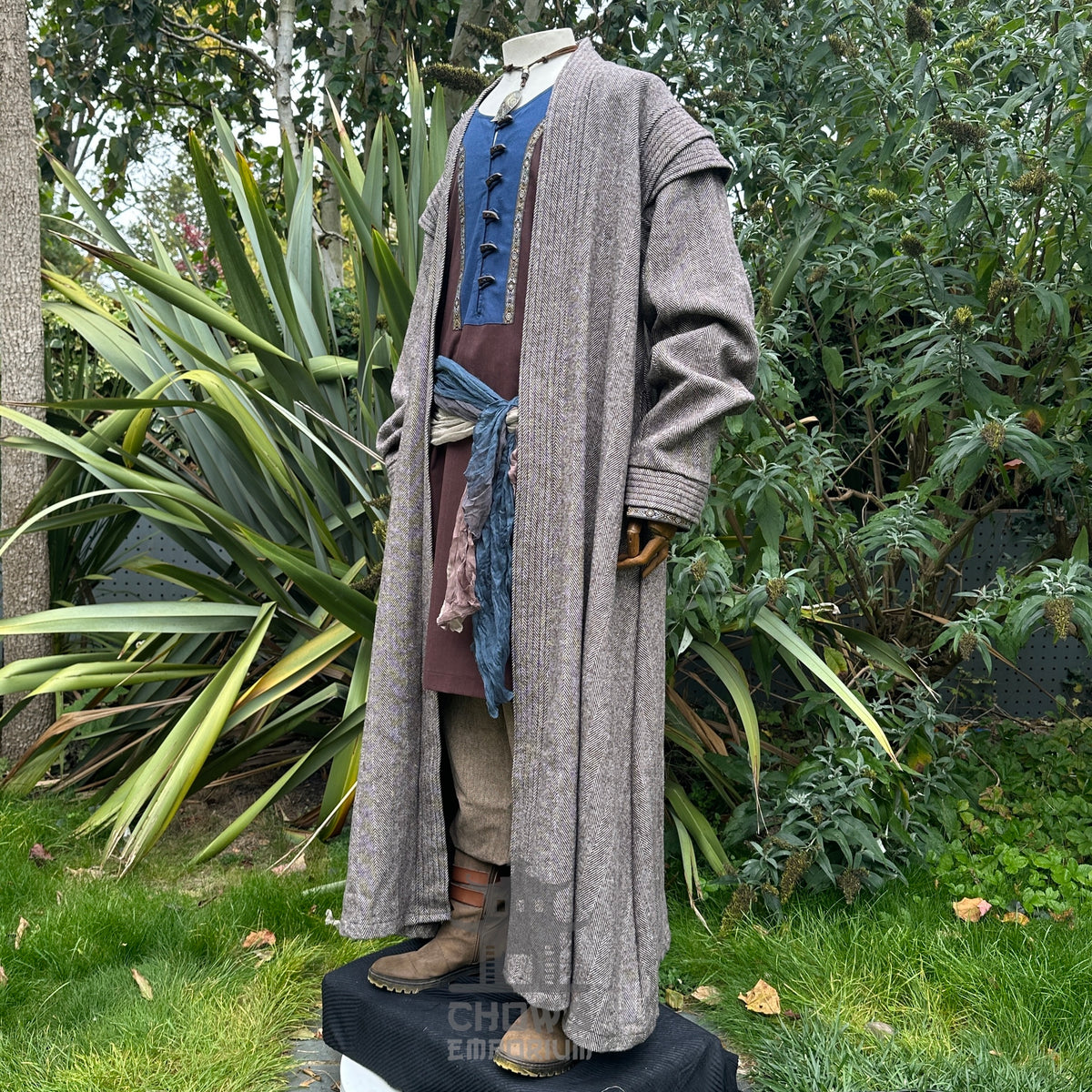 LARP costume set with grey robe, brown tunic, tan pants, blue sash.
