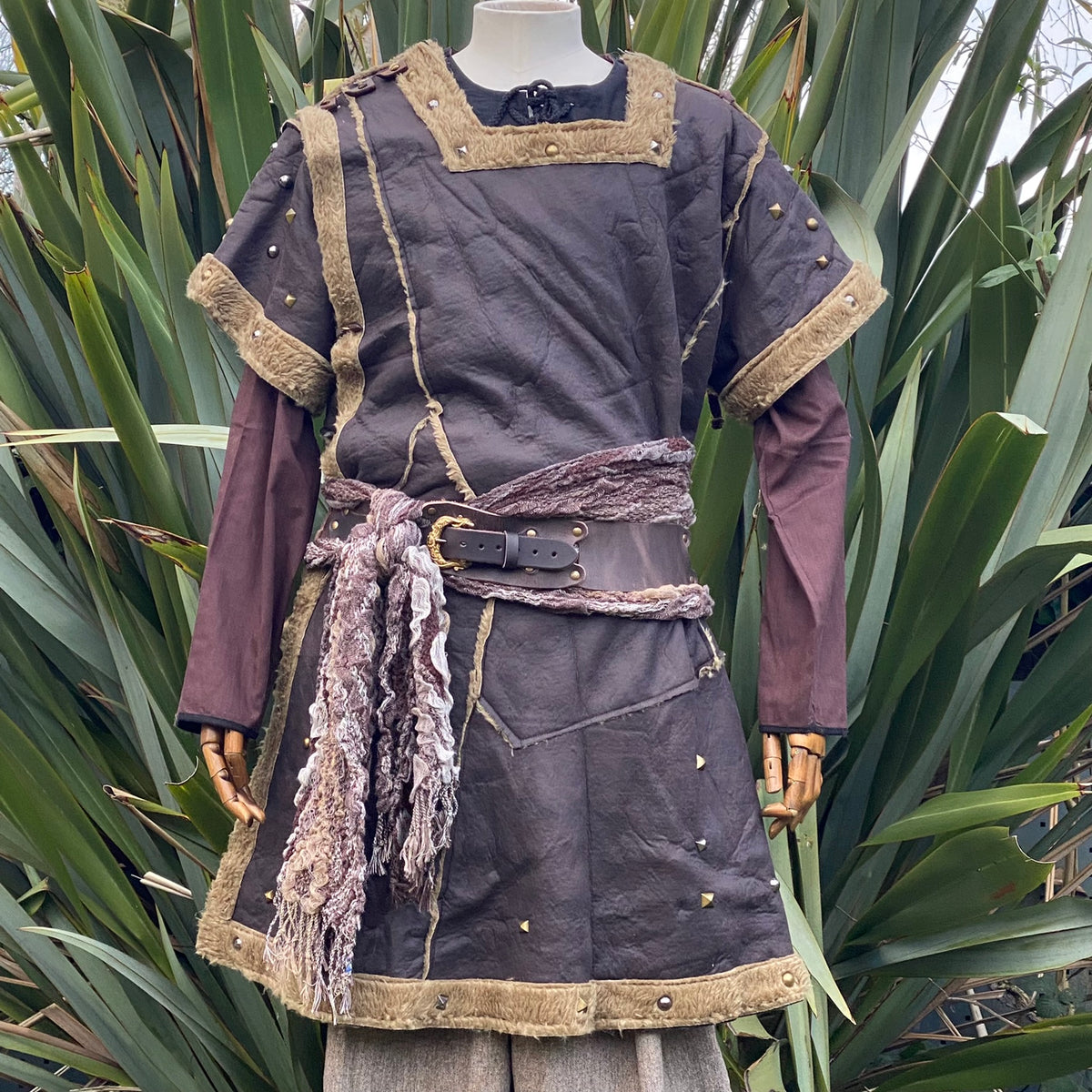 Brown LARP tunic with fur trim and belt, displayed on mannequin.