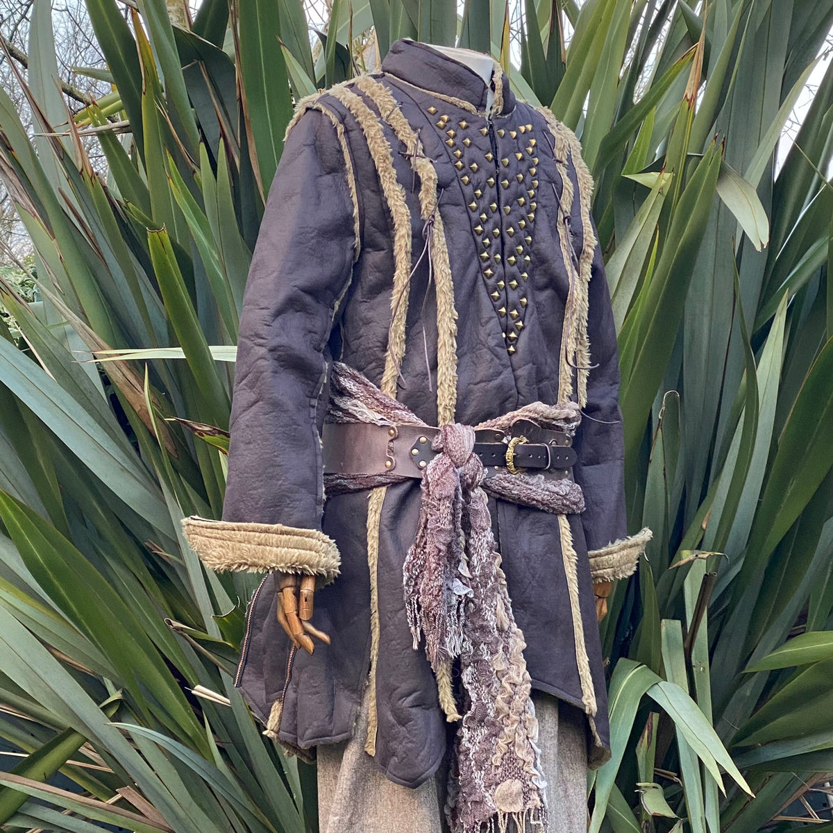 Medieval LARP tunic with studs, beige trim, earthy color, front view.
