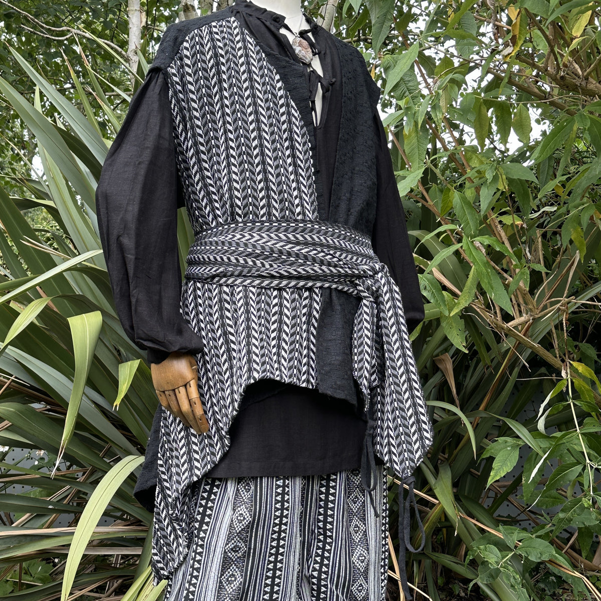 Asymmetrical front panel pirate waistcoat in black and white cotton mix – side angle.