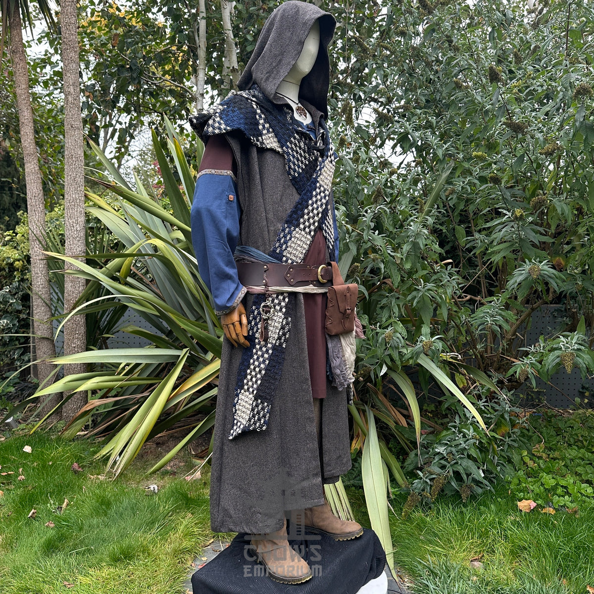 Medieval LARP outfit side view, featuring brown hooded robe, tunic, trousers, hood, belt and sash.