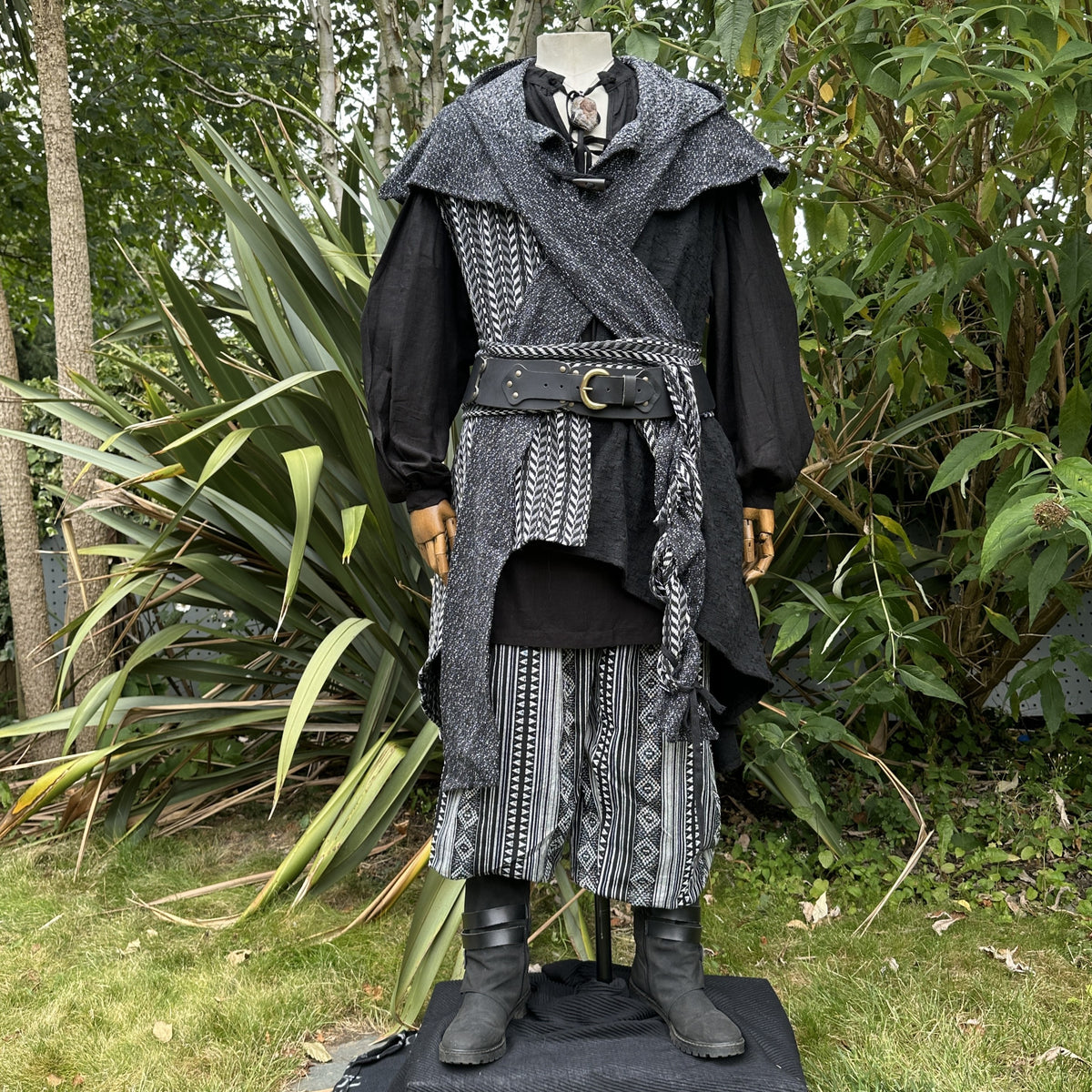 Stone Warrior LARP outfit with black and grey garments, belt, and boots.
