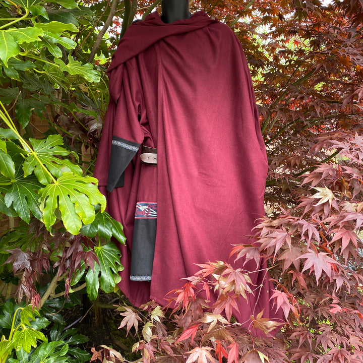 The Four Way LARP Cloak in Red is a Versatile Cape with Hood. The Medieval Cloak is Water Resistant, and helps keep you warm in the cold. The Viking Style Cloak can be worn in four ways for different character needs; perfect for your LARP character, Cosplay Events, and Ren Faires. 