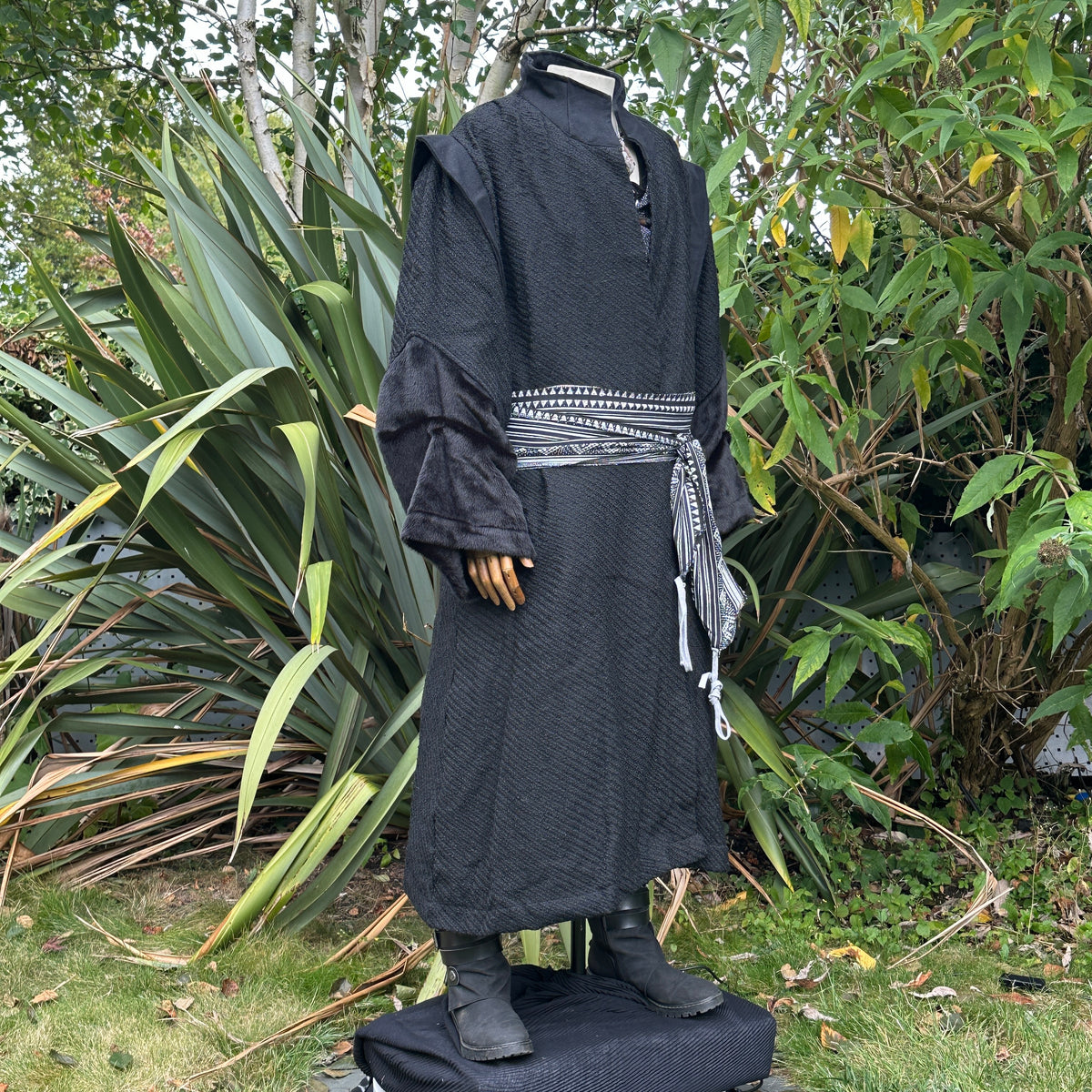 Side view of black wool LARP robe with high collar, medieval fantasy cosplay costume for.