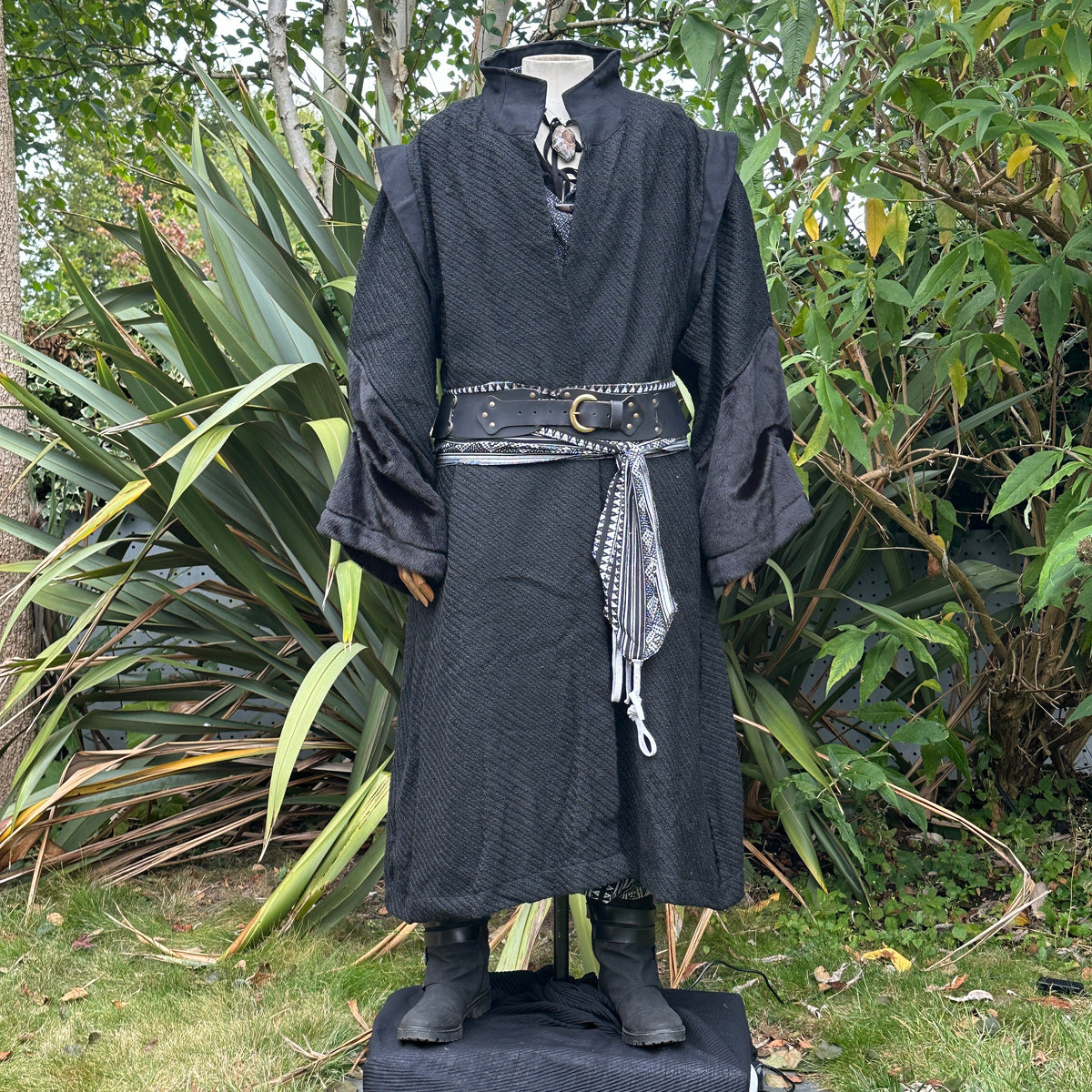 Full-length front view of black wool LARP robe with high collar, medieval fantasy cosplay.