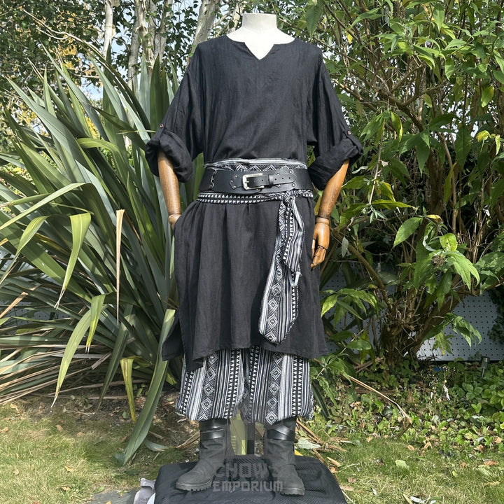 Medieval LARP outfit front view, featuring a black tunic, patterned trousers and sash. For Renaissance Faire and historical roleplay events.