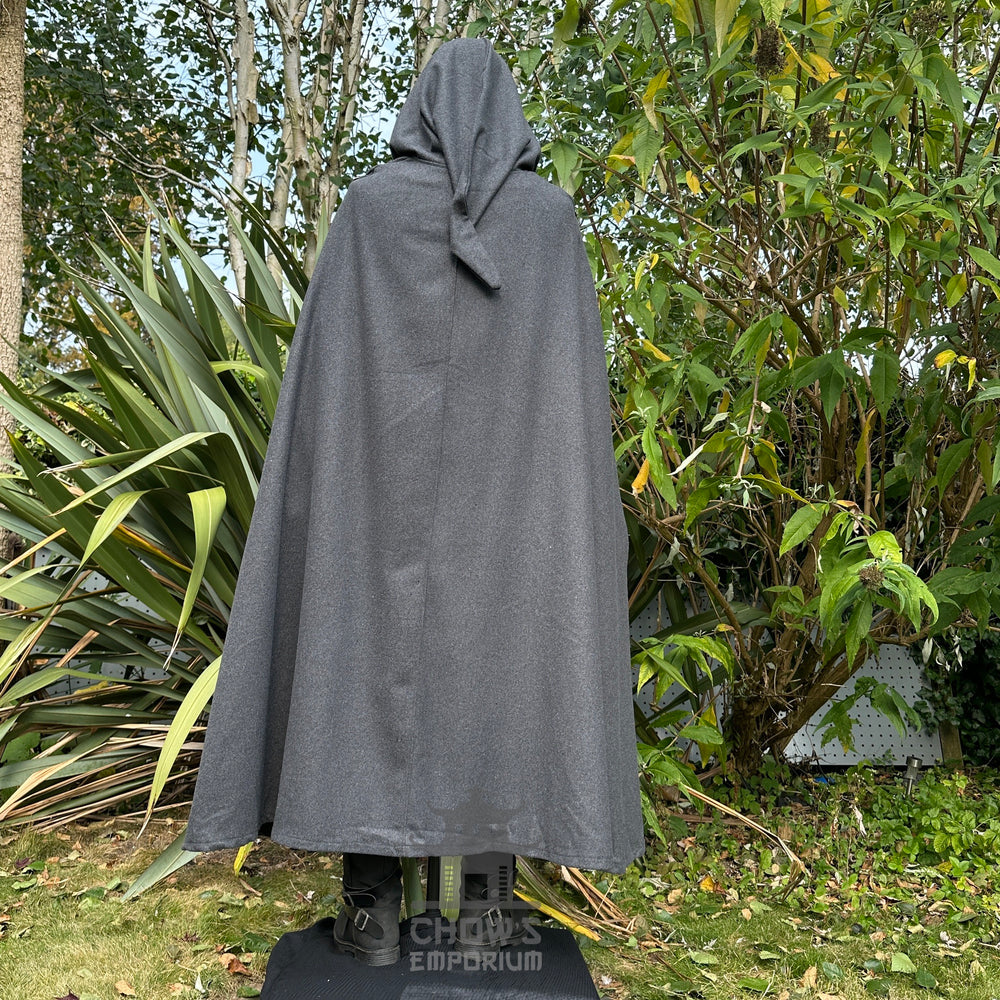 Medieval LARP costume back view featuring grey hooded cloak, tunic, and a black and white sash - ideal for cosplay, LARP, and Renaissance Faire wear.