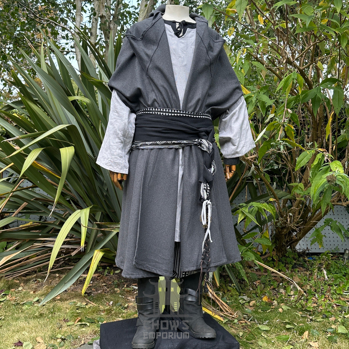 Medieval LARP set in garden, grey cloak with detailed sash, front angle.