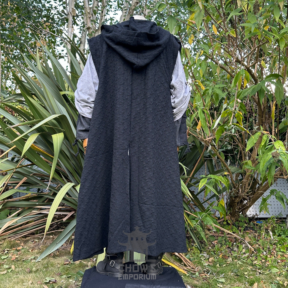 Medieval LARP outfit back view, featuring a black hooded robe, grey tunic, and sash. For Renaissance Faire and historical roleplay events.