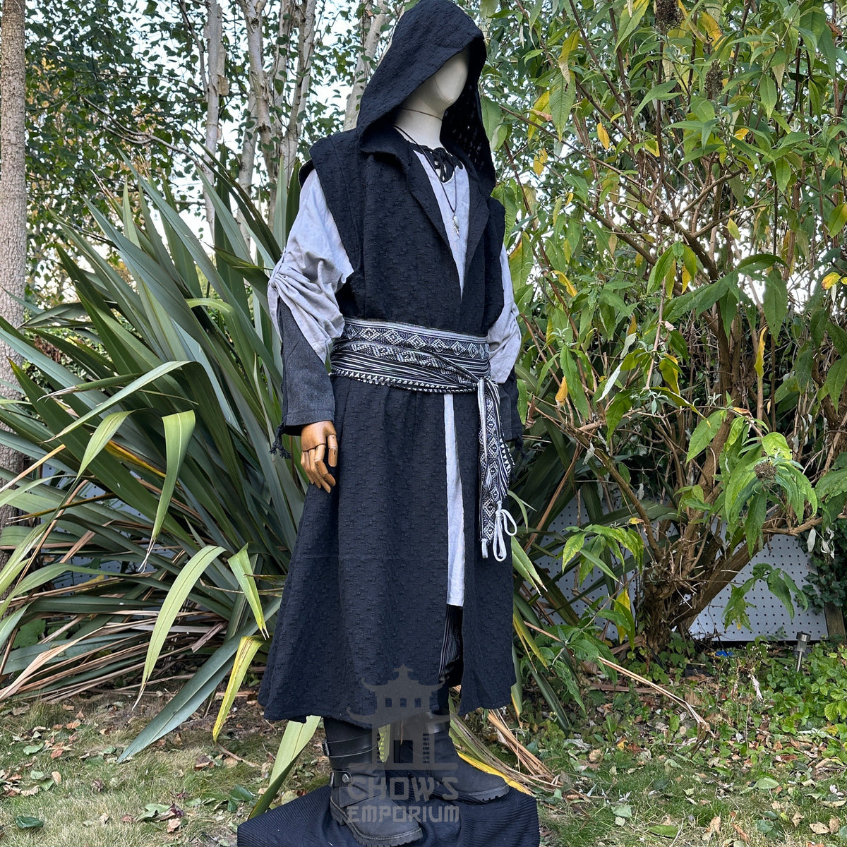 Angled view of black sleeveless medieval LARP robe with hood, fantasy cosplay costume for.