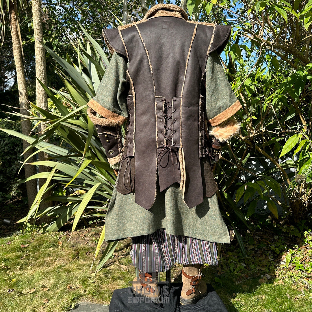 Medieval LARP outfit back view, featuring a brown waistcoat, green tunic, trousers and sash. For Renaissance Faire and historical roleplay events.