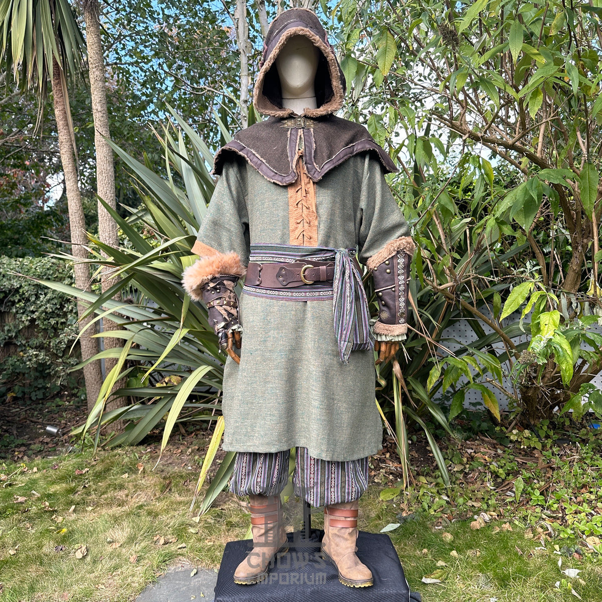 Green and brown woven medieval tunic with hood for LARP, front view.