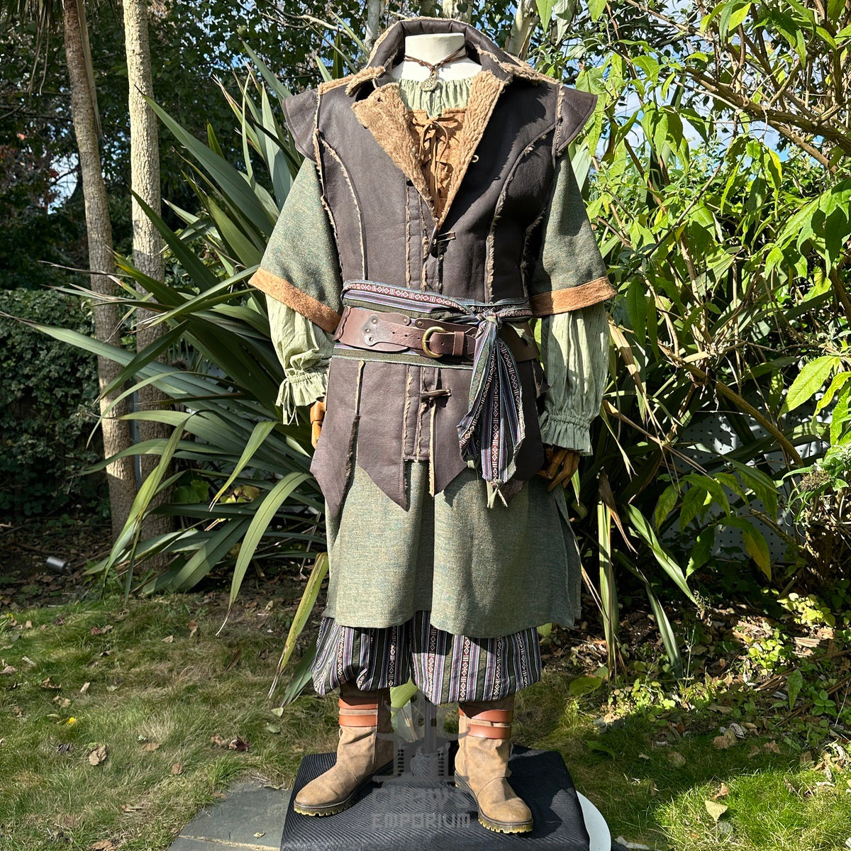 Brown and green medieval LARP outfit with waistcoat, tunic, trousers, and sash.