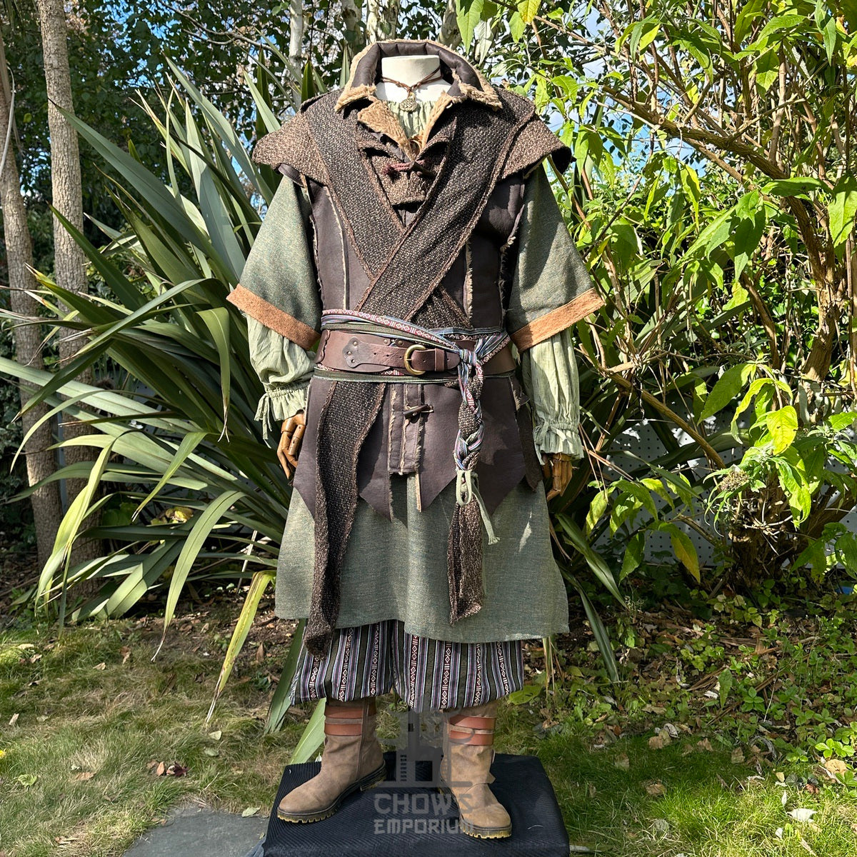 Medieval LARP costume front view, featuring a brown leather waistcoat, tunic, shirt, hood.