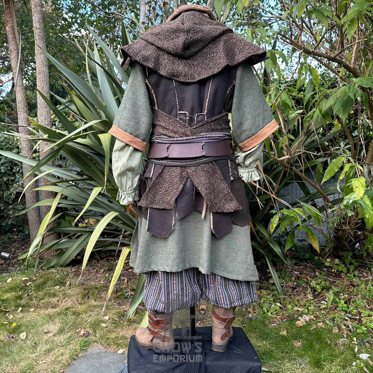 Back view of forest ranger LARP set in green and brown fabric.