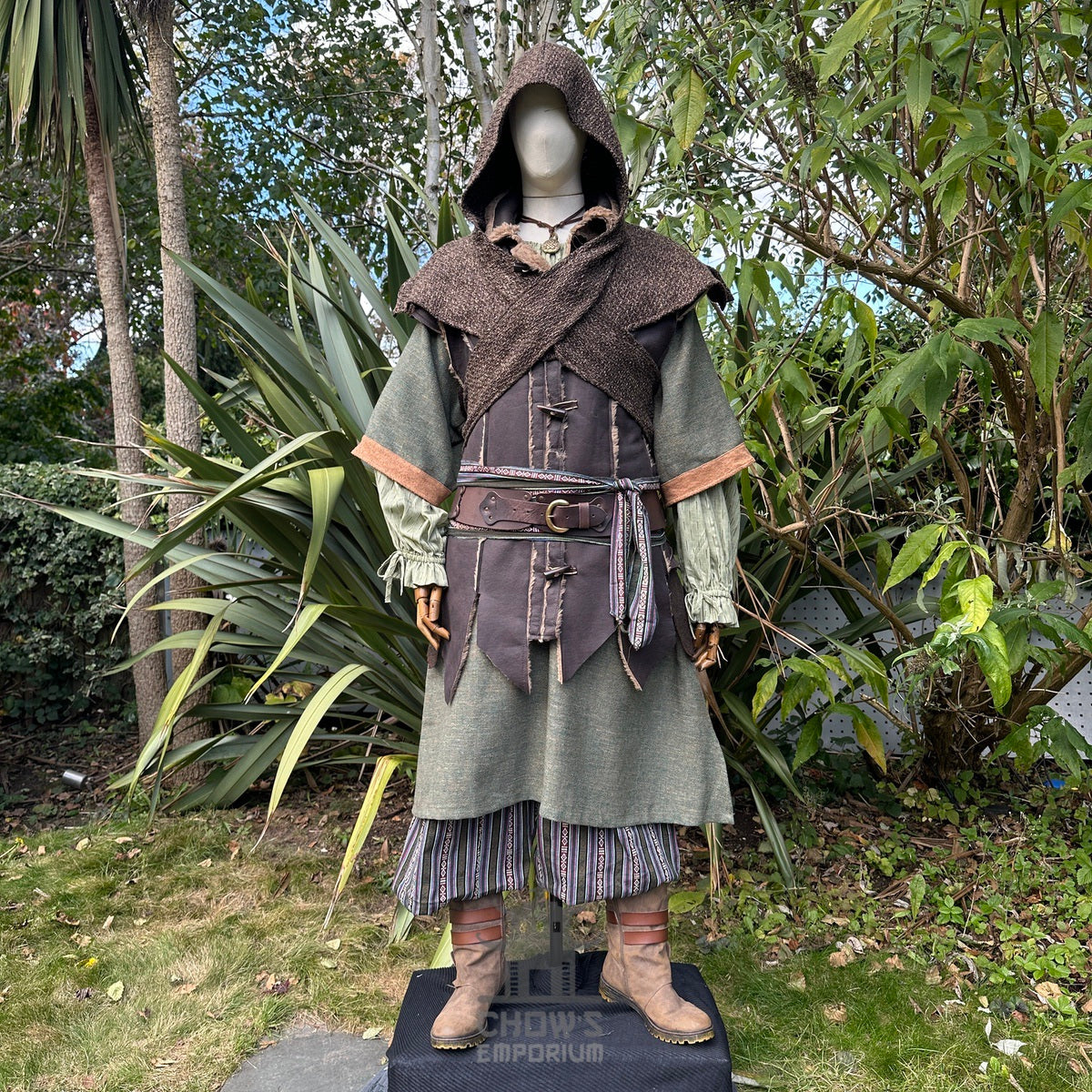 Waistcoat, tunic, shirt, hood, trousers, sash in a medieval LARP style.