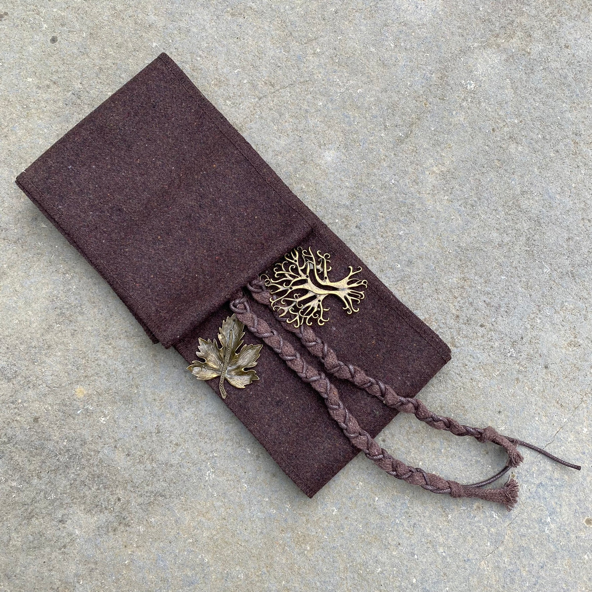 Brown mohair LARP tunic and braided sash with leaf embellishments.