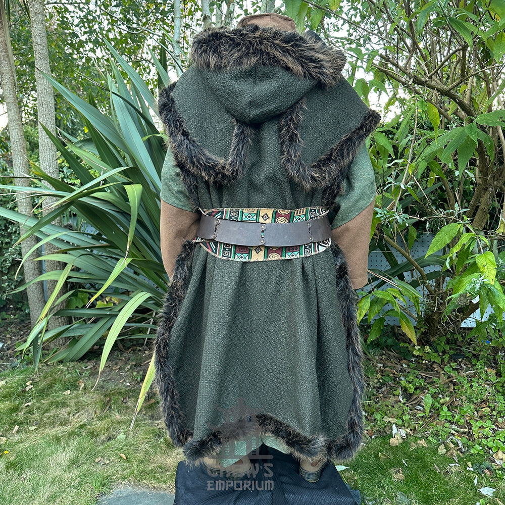 Medieval LARP costume back view, featuring a green faux fur trim hooded cape, high collared robe, leather belt, sash and necklace. For Renaissance Faire and historical roleplay events.
