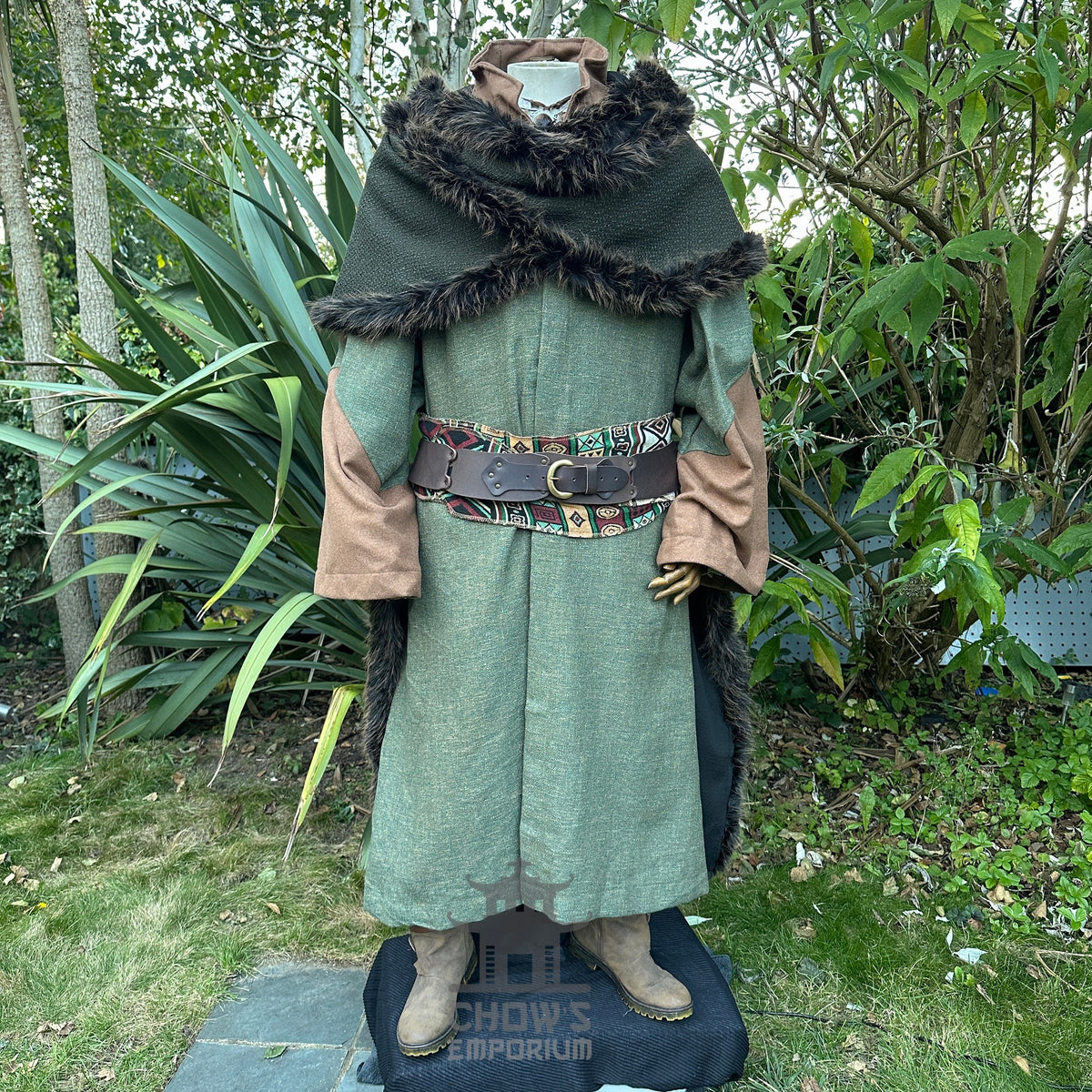 Green LARP warlock robe with ornate belt, brown sleeves, and fur trim.