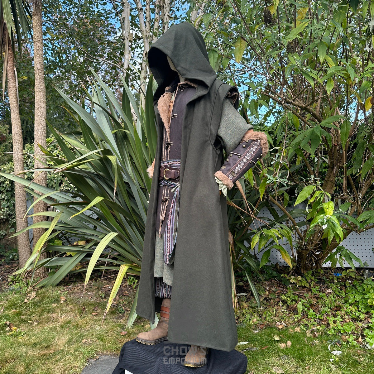 Green hooded sleeveless robe for LARP on mannequin, side view.