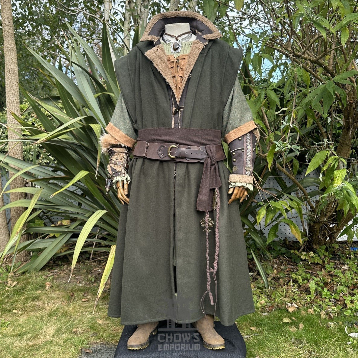 Dark green medieval LARP robe set with brown belt and vambraces.