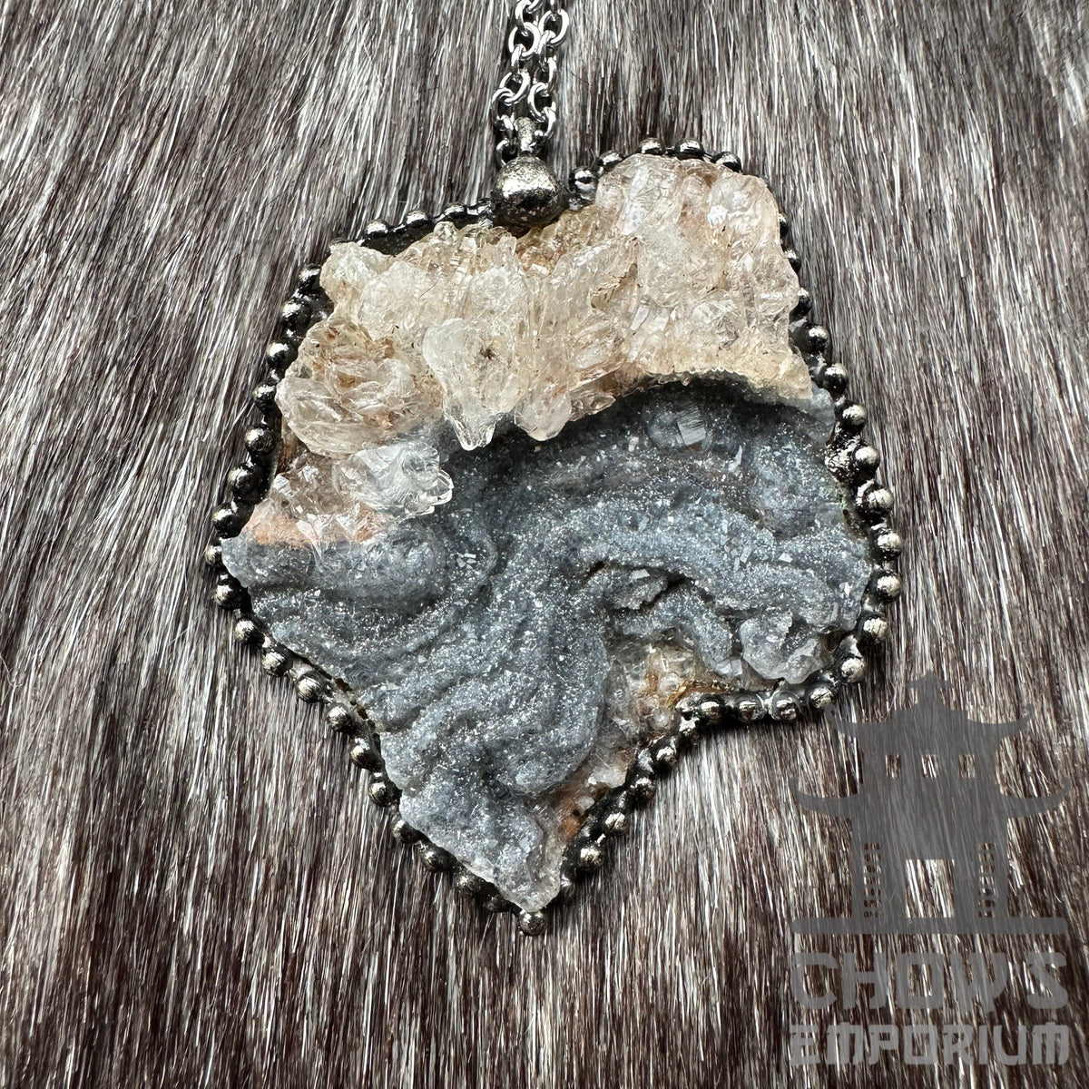 Crystal quartz necklace with white and grey stones on medieval chain.