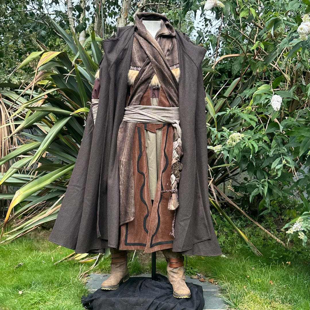 The Four Way LARP Cloak in Brown is a Versatile Cape with Hood. The Medieval Cloak is Water Resistant, and helps keep you warm in the cold. The Viking Style Cloak can be worn in four ways for different character needs; perfect for your LARP character, Cosplay Events, and Ren Faires. 