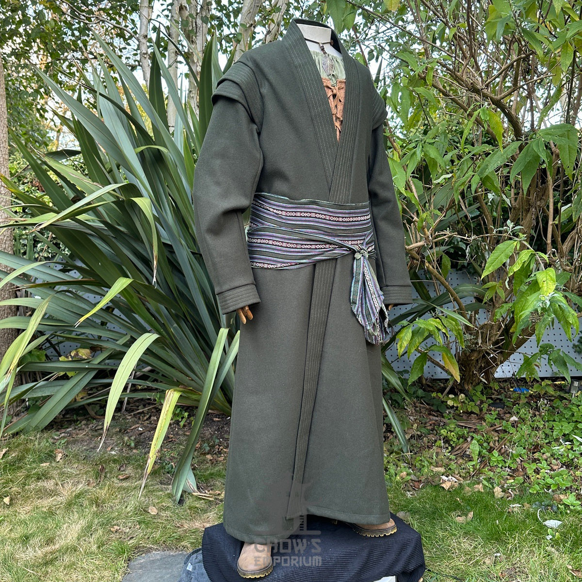 Angled view of green wool-mix LARP robe, medieval fantasy costume ideal for knights.