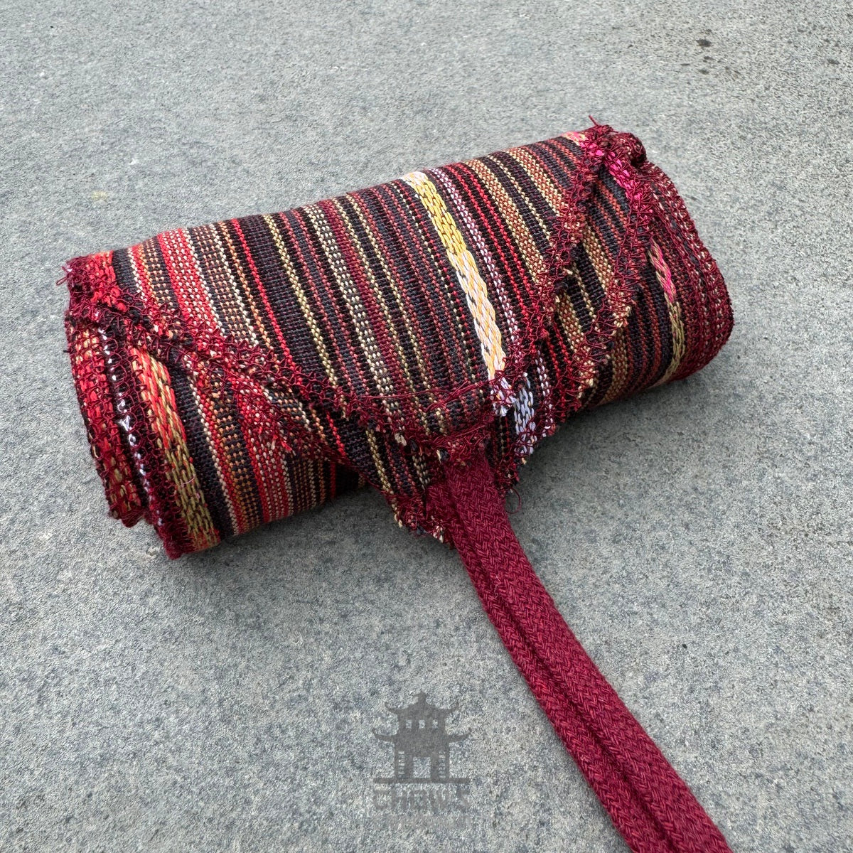 Rolled striped medieval sash with intricate crimson fringe for LARP.
