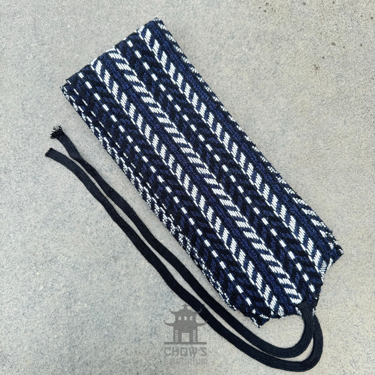 Black, white, blue herringbone sash, fabric close-up for LARP.