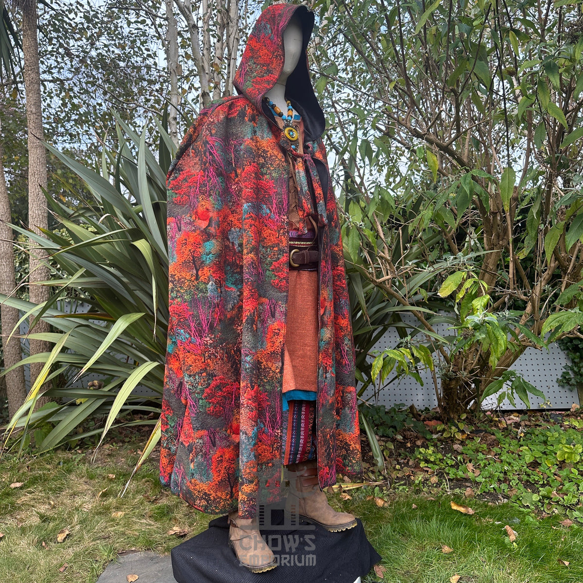 Hooded Autumn Druid Cloak shown at an angle, autumn leaf design and fur lining for fantasy.