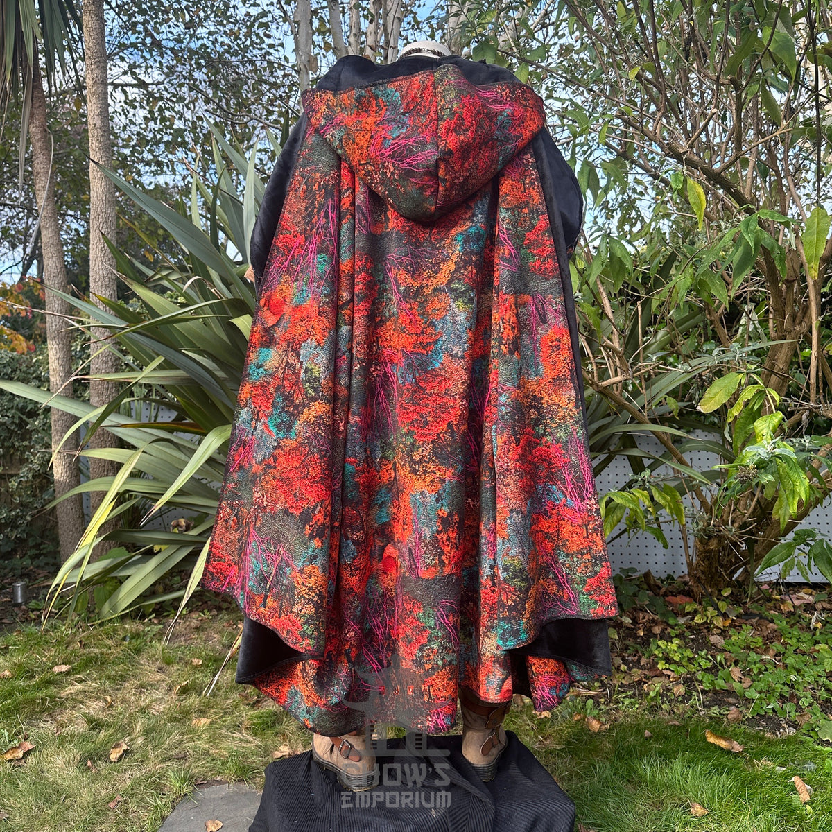 Back view of LARP druid cloak showing vibrant autumn leaf pattern.