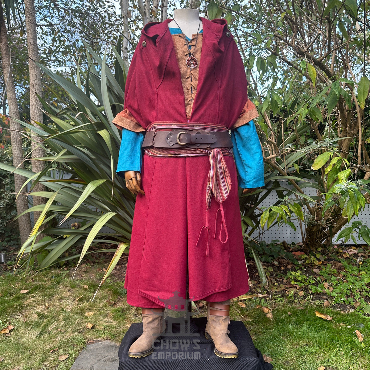 Red wool hooded LARP cloak worn over layered medieval costume, fantasy cosplay outfit for.