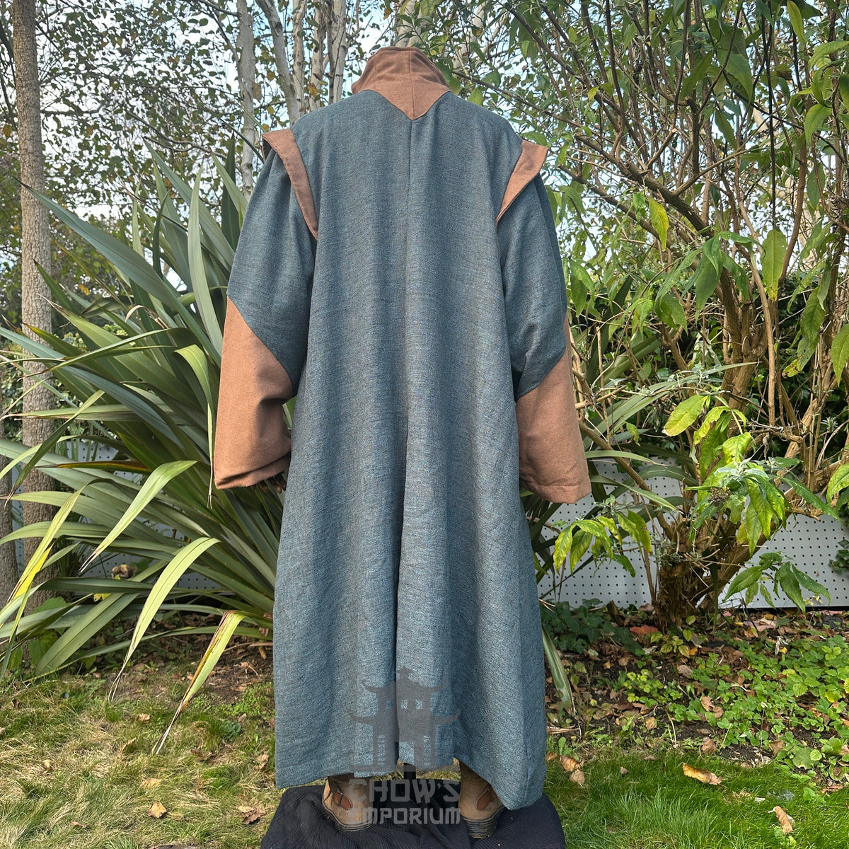 Rear view of teal medieval LARP robe with brown sleeves.