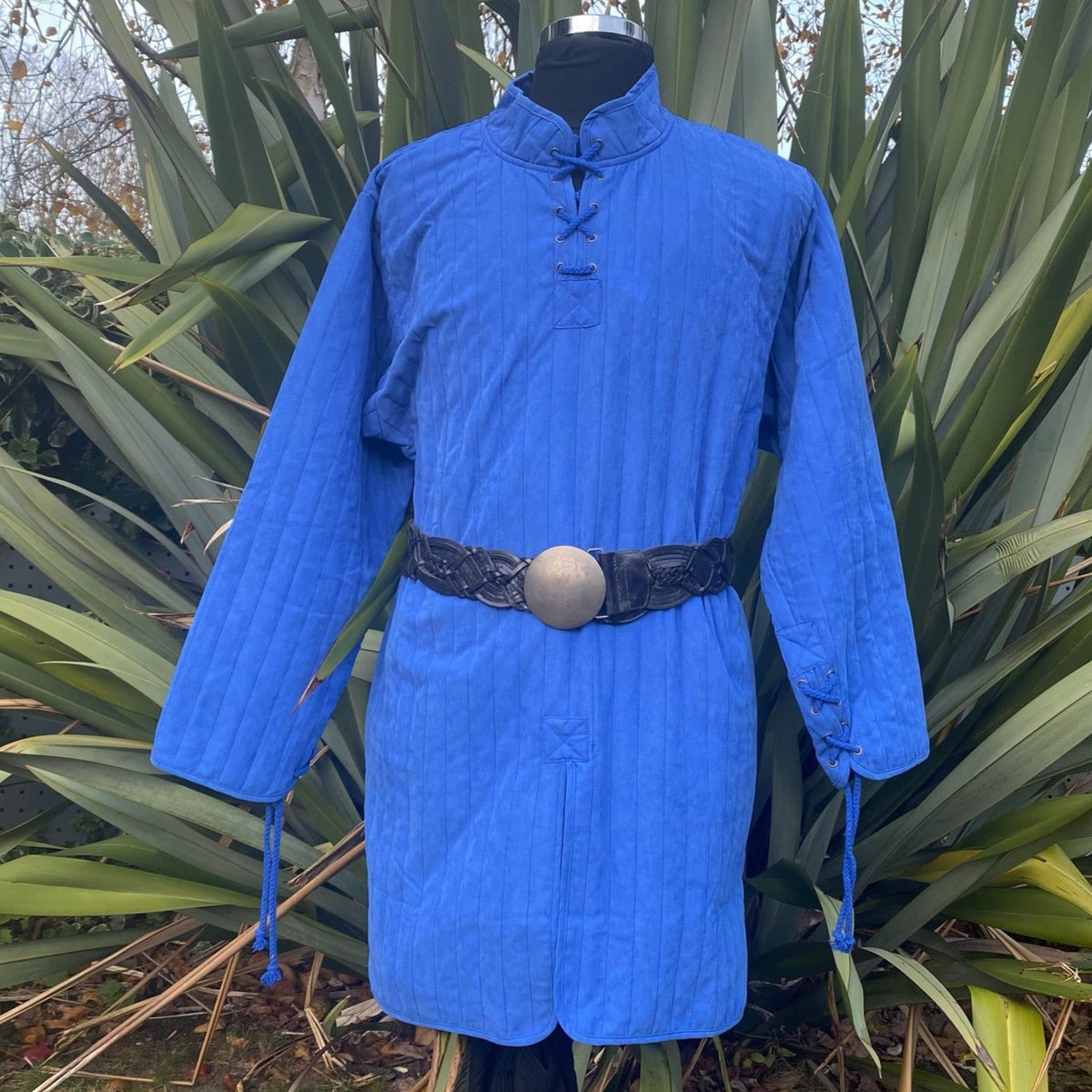 Blue LARP gambeson with detailed black belt front view.