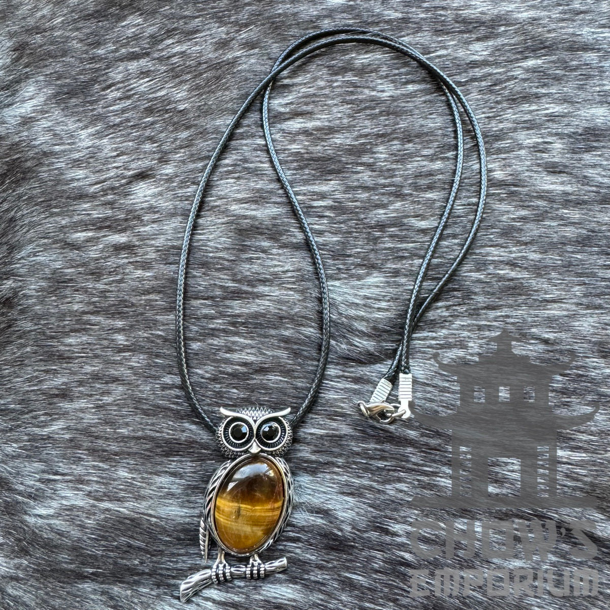 LARP medieval necklace with amber owl pendant on braided cord.