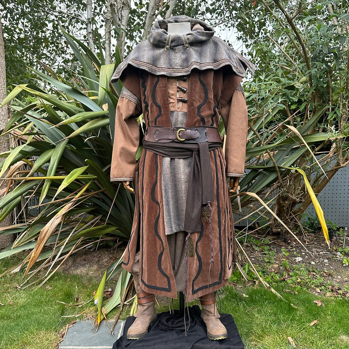 Brown and grey medieval hood with button details, styled for LARP cleric.