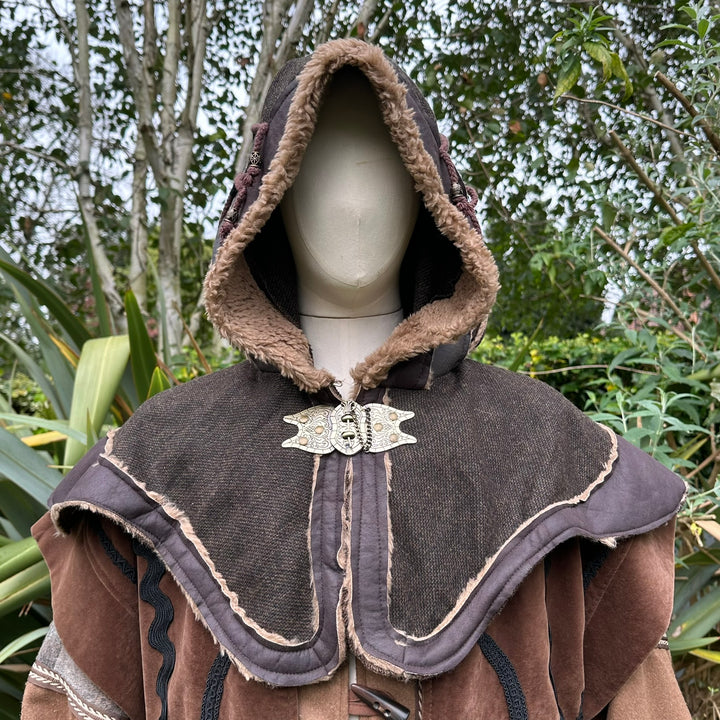 This Layered LARP Hood in Brown & Green Faux Leather has a Fleece Lining in Brown. This Viking Hood is Water Resistant towards rain. The Medieval Hood covers your shoulders and provides warmth. Perfect for your LARP Character and LARP Costume, Cosplay Event, and Ren Faire.