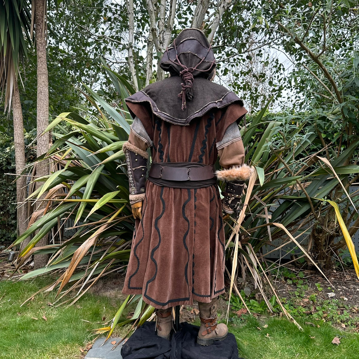 Rear view of layered LARP Viking hood and cloak in brown.