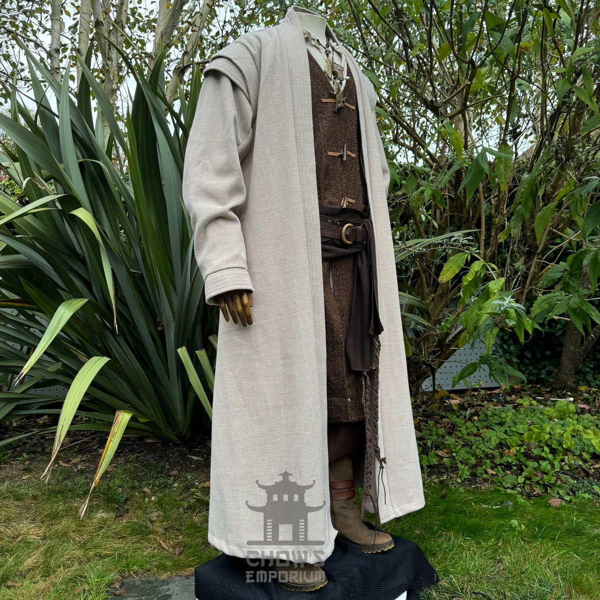Medieval LARP robe in beige herringbone fabric with brown trim, noble fantasy cosplay costume.