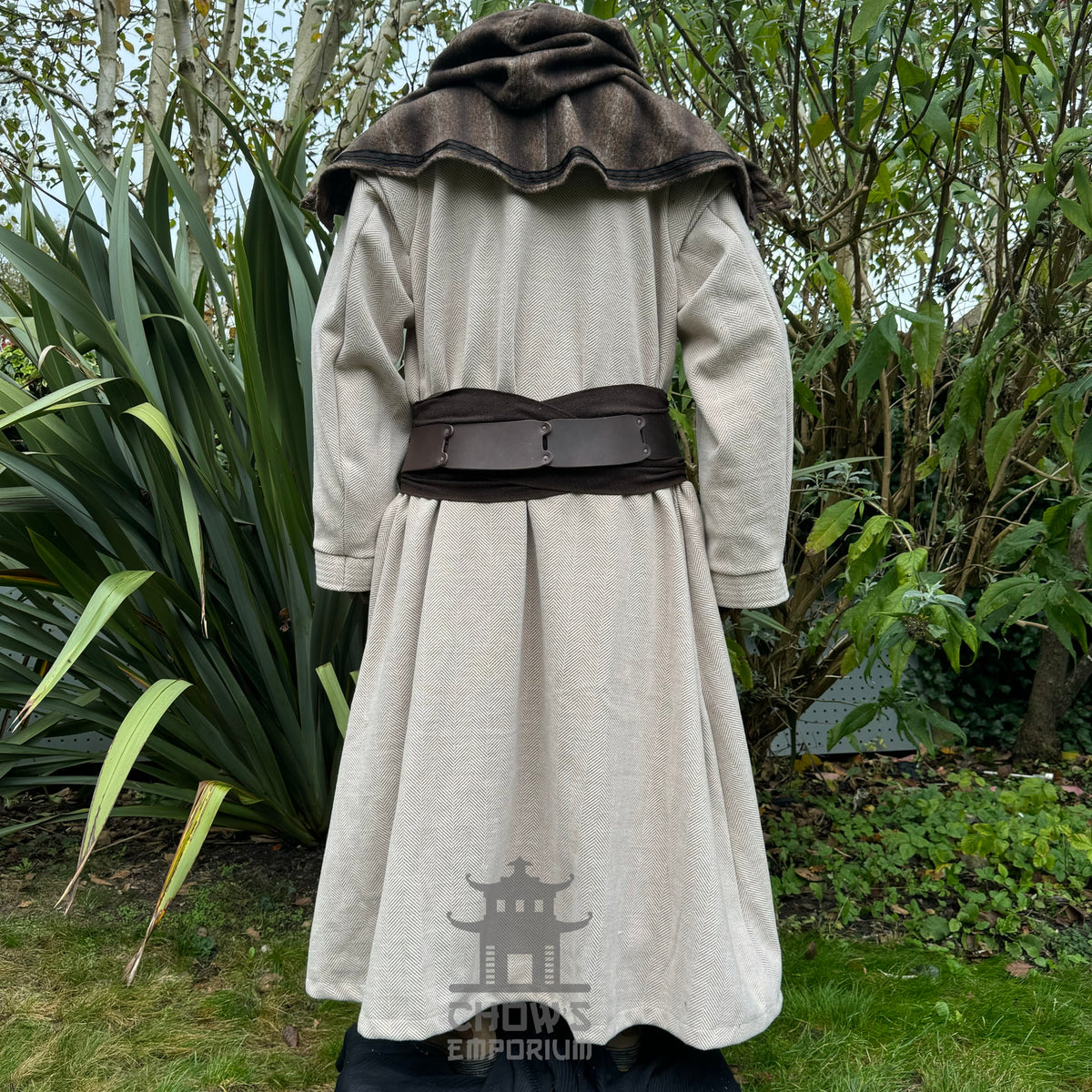 Rear view of medieval LARP robe with hood and leather sash.