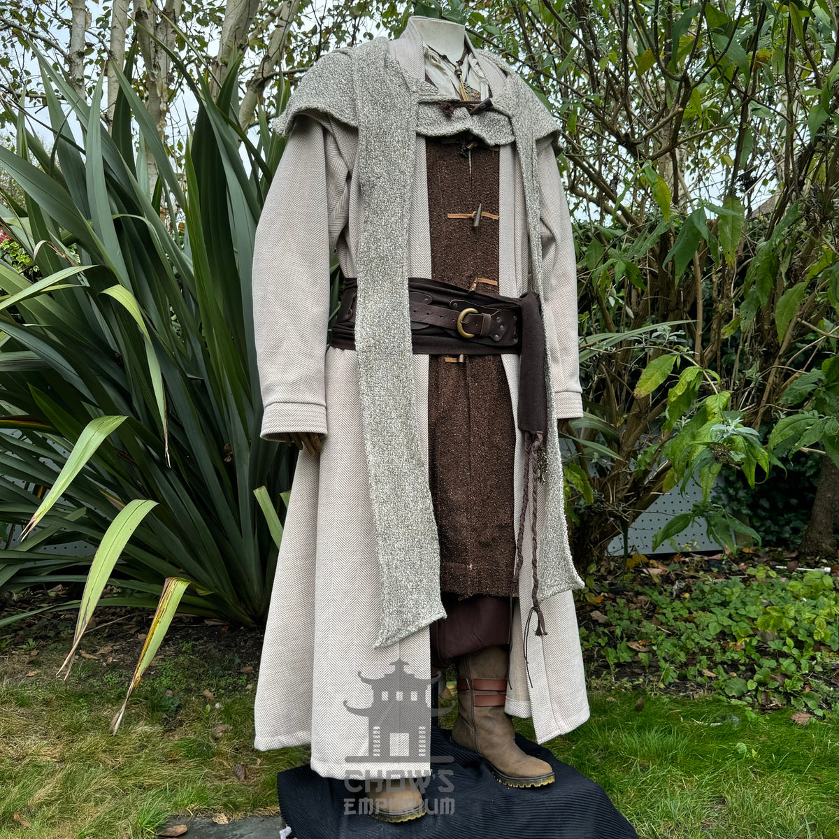 Textured beige and brown fabric of medieval LARP robe, authentic fantasy costume for cosplay and.