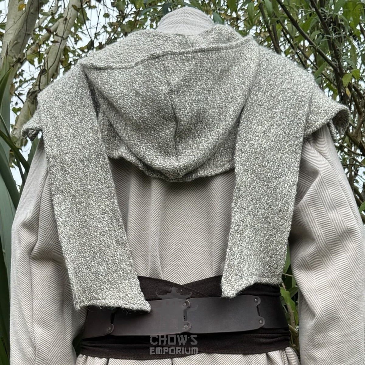 Back view of LARP costume with textured hood and black belt.