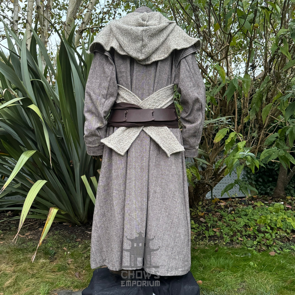 Rear angle of medieval LARP healer robe with textured hood and wide belt.